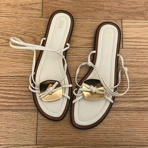 White Sandles with gold buckle